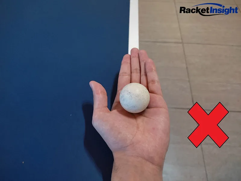 Don't hold the ball over the table